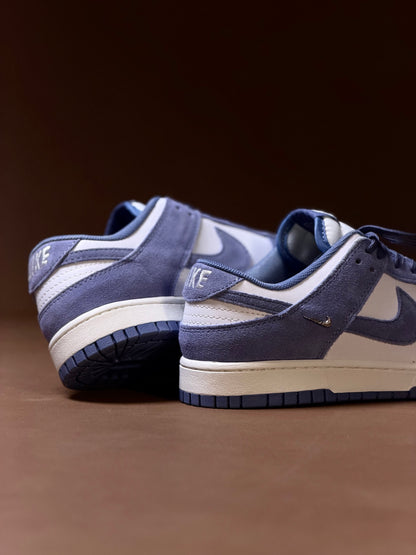 Nike Dunk Low
World Indigo Mini Swoosh